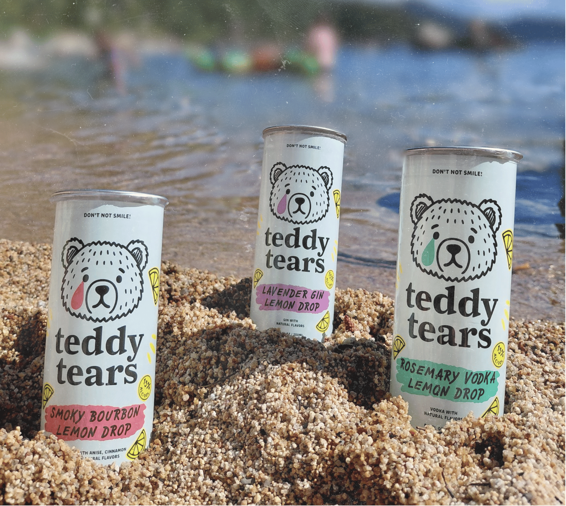 Teddy Tears cans on beach